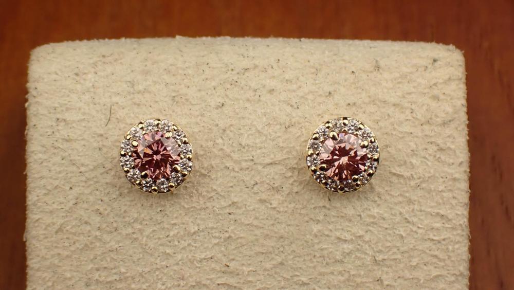 Appraisal: PAIR OF PINK AND WHITE DIAMOND EAR STUDS each k