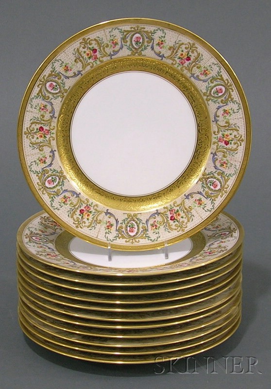 Appraisal: Twelve French Painted and Parcel-gilt Service Plates early th century