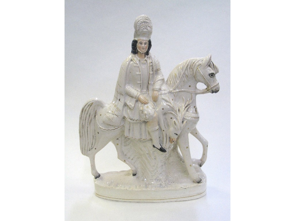 Appraisal: Staffordshire figure of a Highland huntsman on horseback