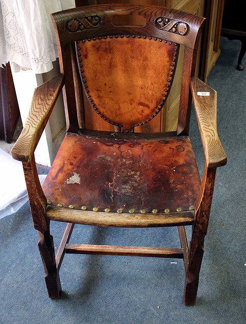 Appraisal: AN EARLY TO MID TH CENTURY OAK OPEN ARMCHAIR with