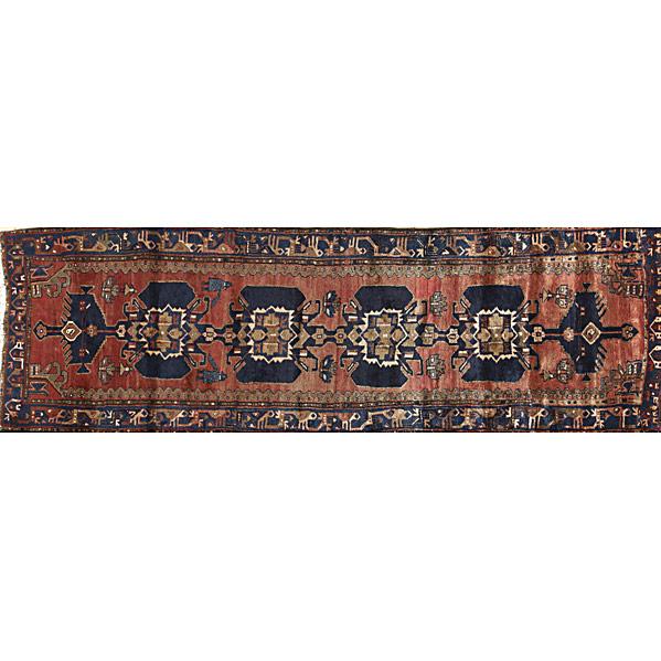 Appraisal: ORIENTAL RUNNERBlue design on rust background th c x