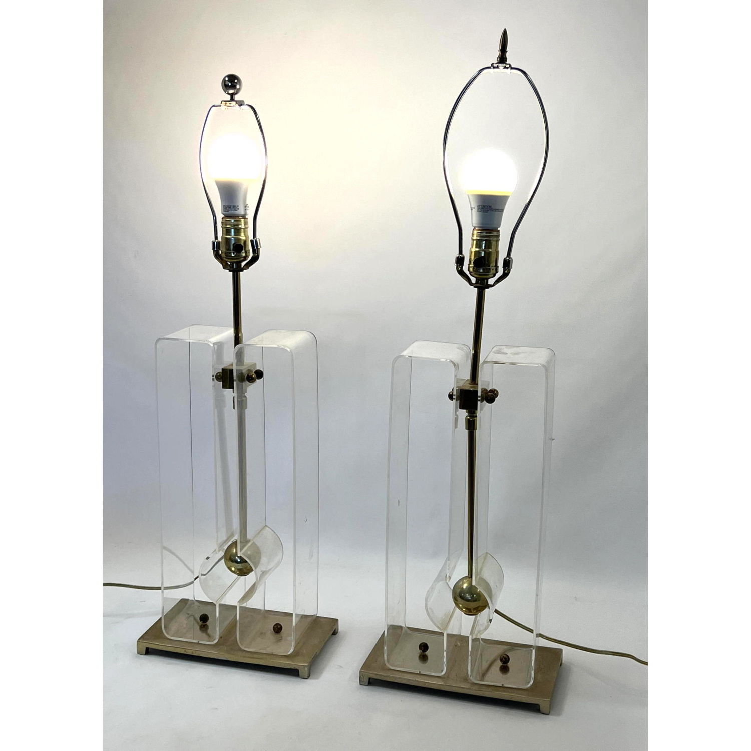 Appraisal: Laurel lucite and brass table lamps Dimensions H inches W