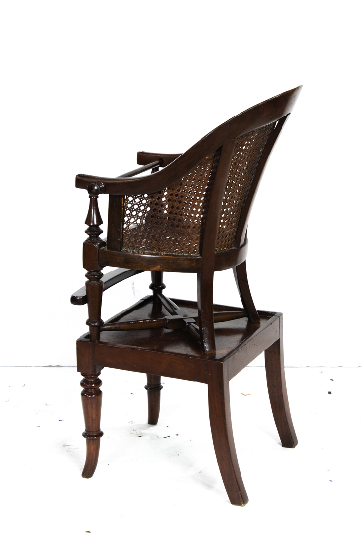 Appraisal: AN ENGLISH VICTORIAN MAHOGANY CHILD'S HIGHCHAIR An English Victorian mahogany