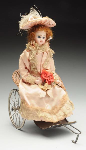 Appraisal: Lady Doll in Wicker Cart French bisque head with glass