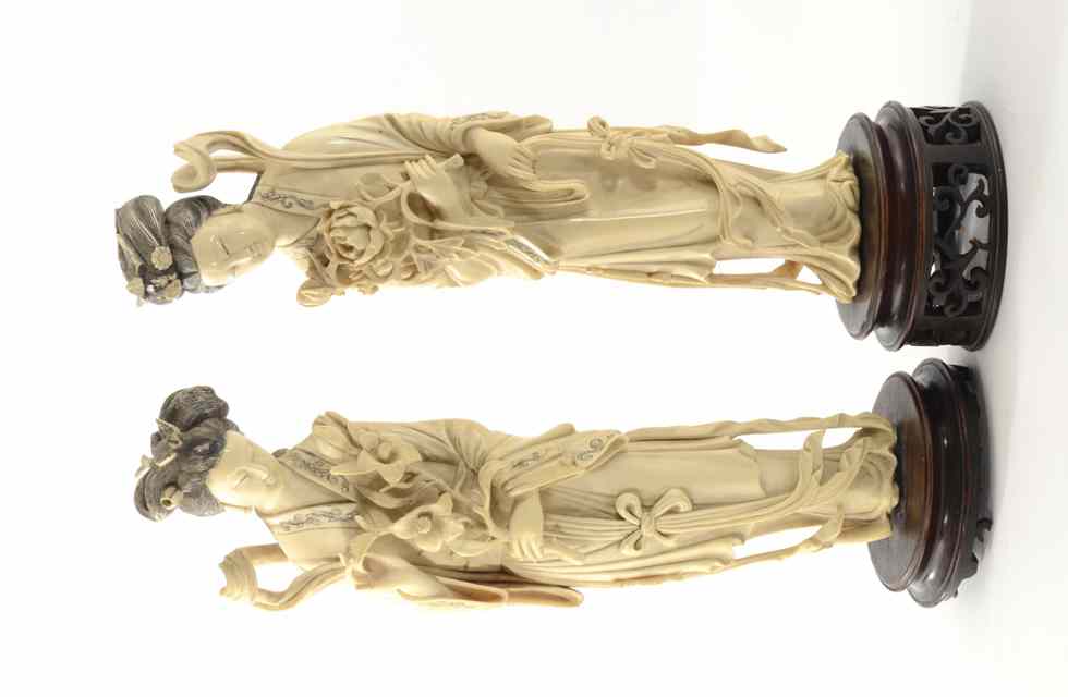 Appraisal: PAIR CHINESE IVORY CARVED FIGURES of Quan Yin the goddess