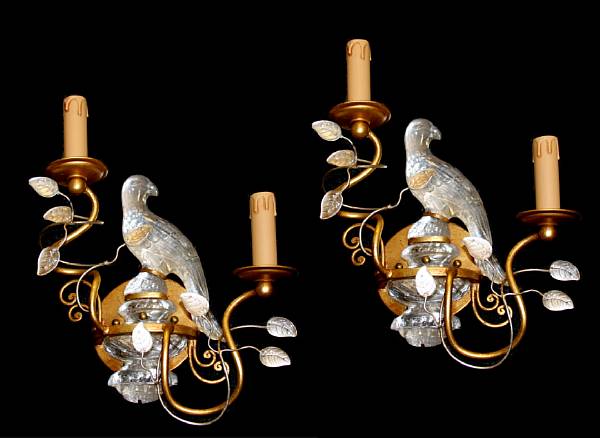 Appraisal: A pair of gilt metal and crystal figural wall sconces