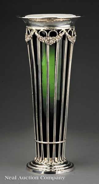 Appraisal: A Decorative Silverplate Wirework and Glass Trumpet Vase with emerald