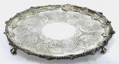 Appraisal: A VICTORIAN SALVER of circular form with gadroon and shell