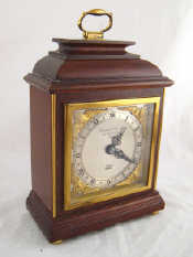 Appraisal: An eight day mantel clock by Elliott for Garrard and