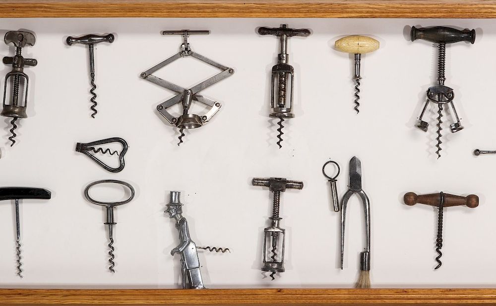 Appraisal: A COLLECTION OF ANTIQUE COLLECTIBLE CORKSCREWS Corkscrews openers and champagne