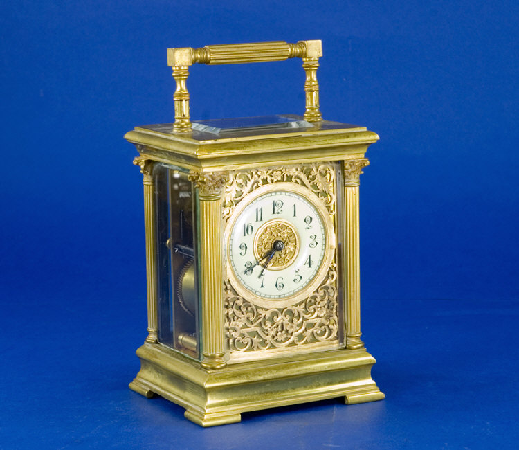 Appraisal: French Brass Cased Carriage Clock French Carriage Clock pierced foliate