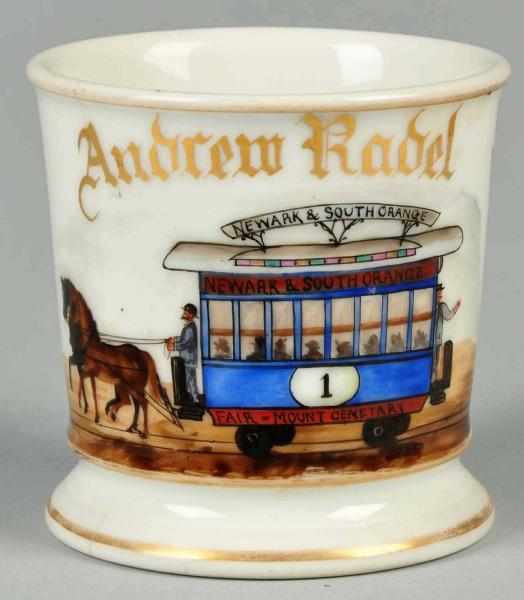 Appraisal: Double Horse-Drawn Trolley Shaving Mug Description Gilt name Andrew Radel