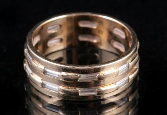 Appraisal: K YELLOW GOLD AND DIAMOND BAND Two rows of nine