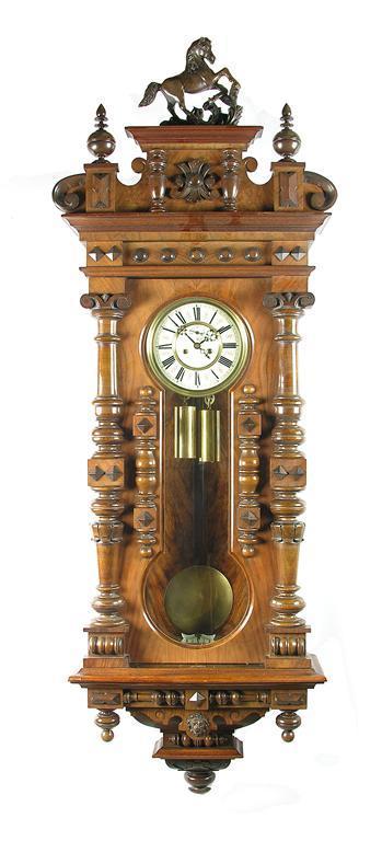 Appraisal: A walnut Vienna regulator