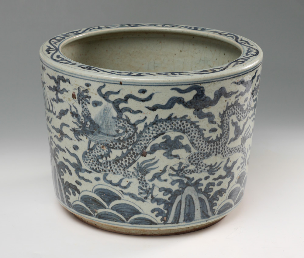 Appraisal: BLUE WHITE DECORATED CHINESE JARDINIERE Dragon in clouds flying above