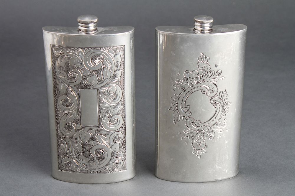 Appraisal: Hoffritz English Pewter Scroll Engraved Flasks Group of two Hoffritz