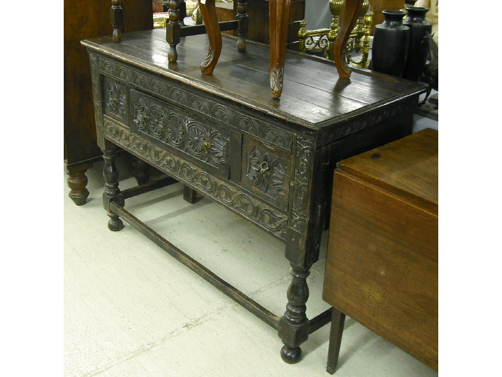 Appraisal: th century oak dresser base the moulded top over a