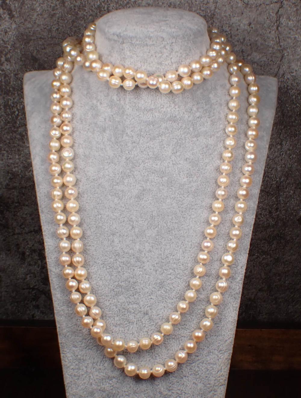 Appraisal: ROPE LENGTH BAROQUE PEARL NECKLACE hand-knotted strand of well matched