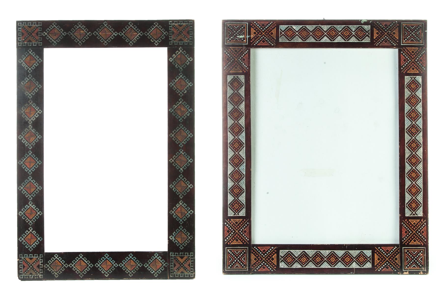 Appraisal: TWO CARVED AND PAINTED FRAMES American ca poplar Geometric designs