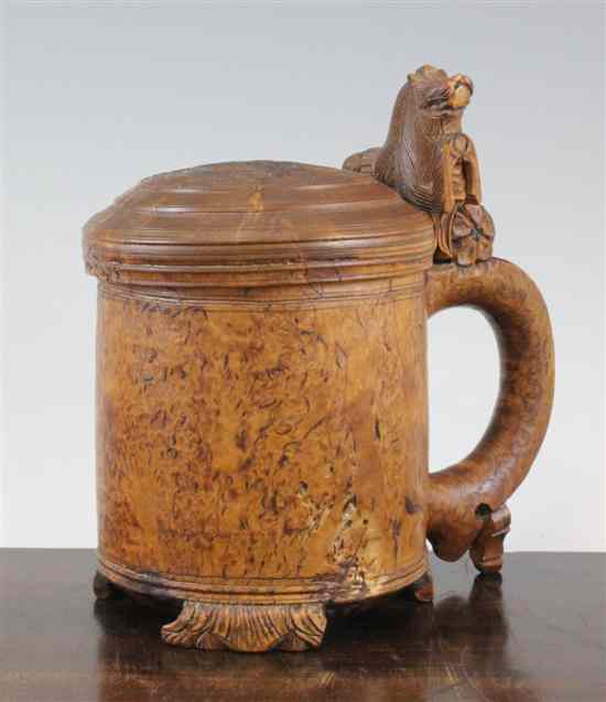 Appraisal: A burrwood lidded tankard Norwegian late th century with lion