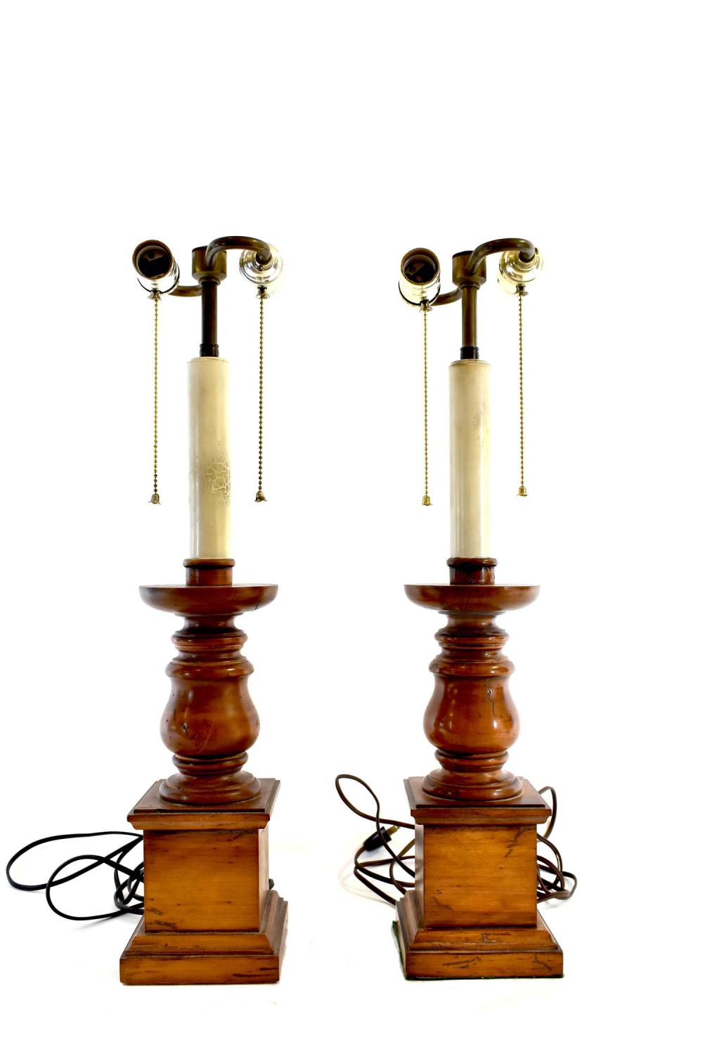 Appraisal: PAIR OF CONTINENTAL TREEN LAMPSThe baluster-turned stems on square plinths