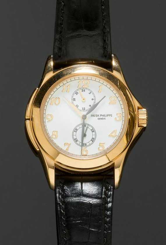 Appraisal: GENTLEMAN'S WRISTWATCH PATEK PHILIPPE CALATRAVA TRAVEL TIME Pink gold Ref