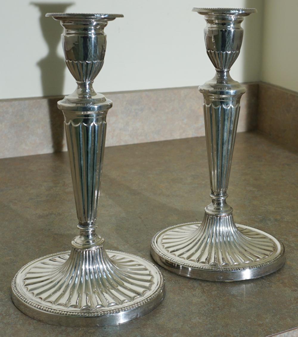 Appraisal: PAIR OF ENGLISH ADAM STYLE SILVERPLATE CANDLESTICKS IN CM Pair