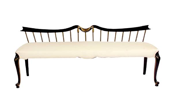 Appraisal: A Neoclassical style parcel gilt ebonized window bench with fully