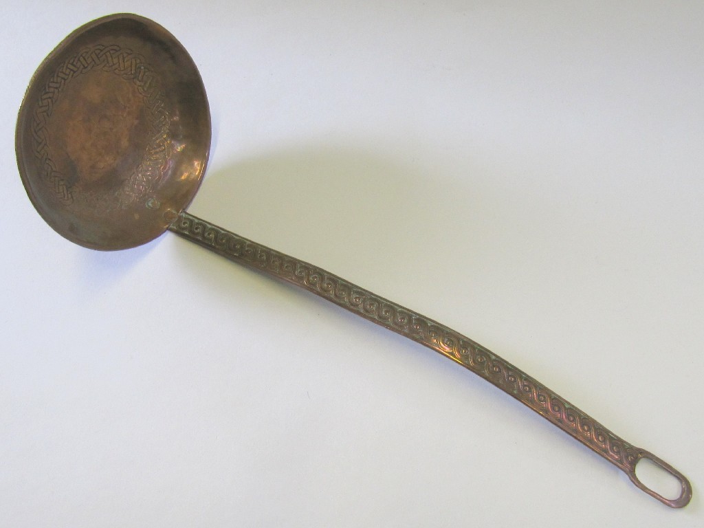 Appraisal: Iain McCormick Iona copper ladle with Celtic decoration