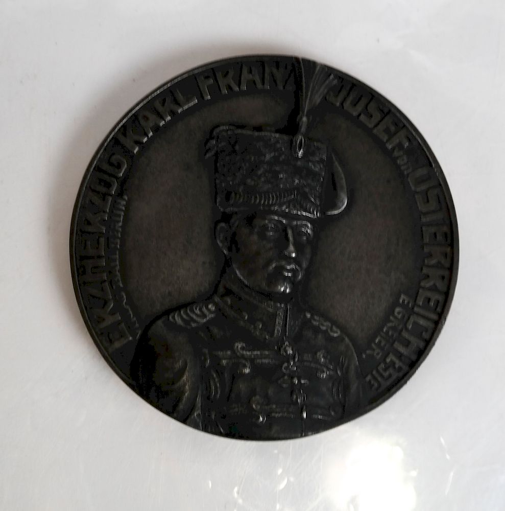 Appraisal: Karl Franz Josef Cast Iron Medal by E Greier Half-length