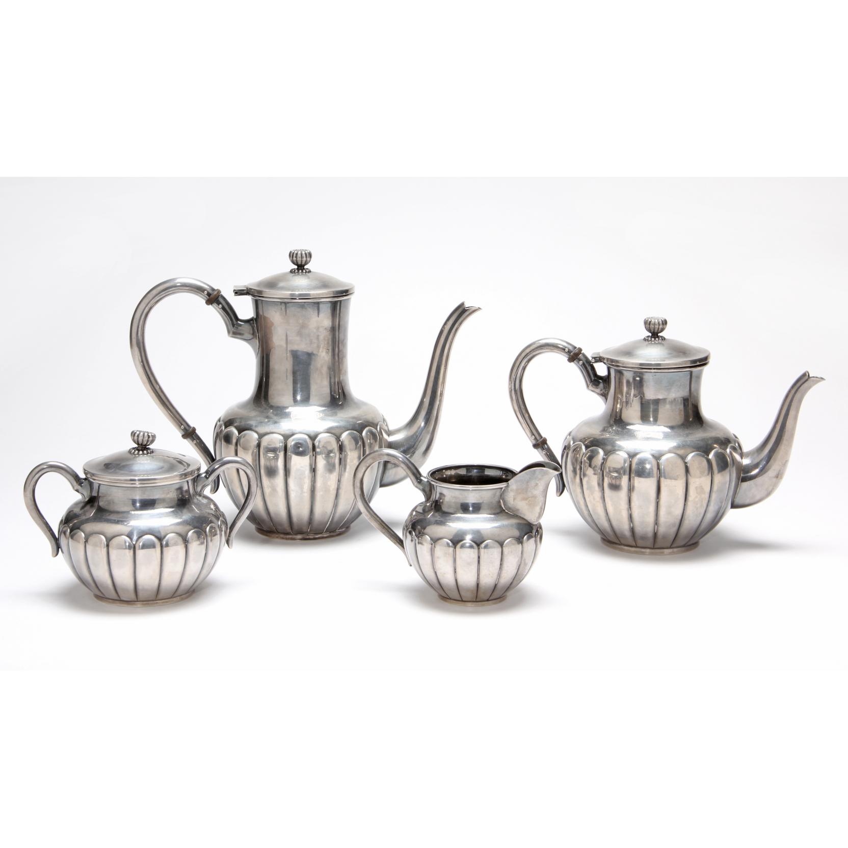 Appraisal: Japanese Fine Silver Tea Coffee Service silver content lobed bodies