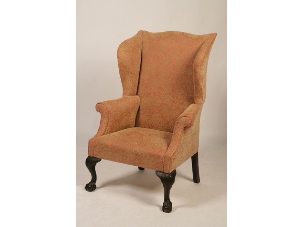 Appraisal: A GEORGE III STYLE MAHOGANY WING BACK ARMCHAIR the upholstered