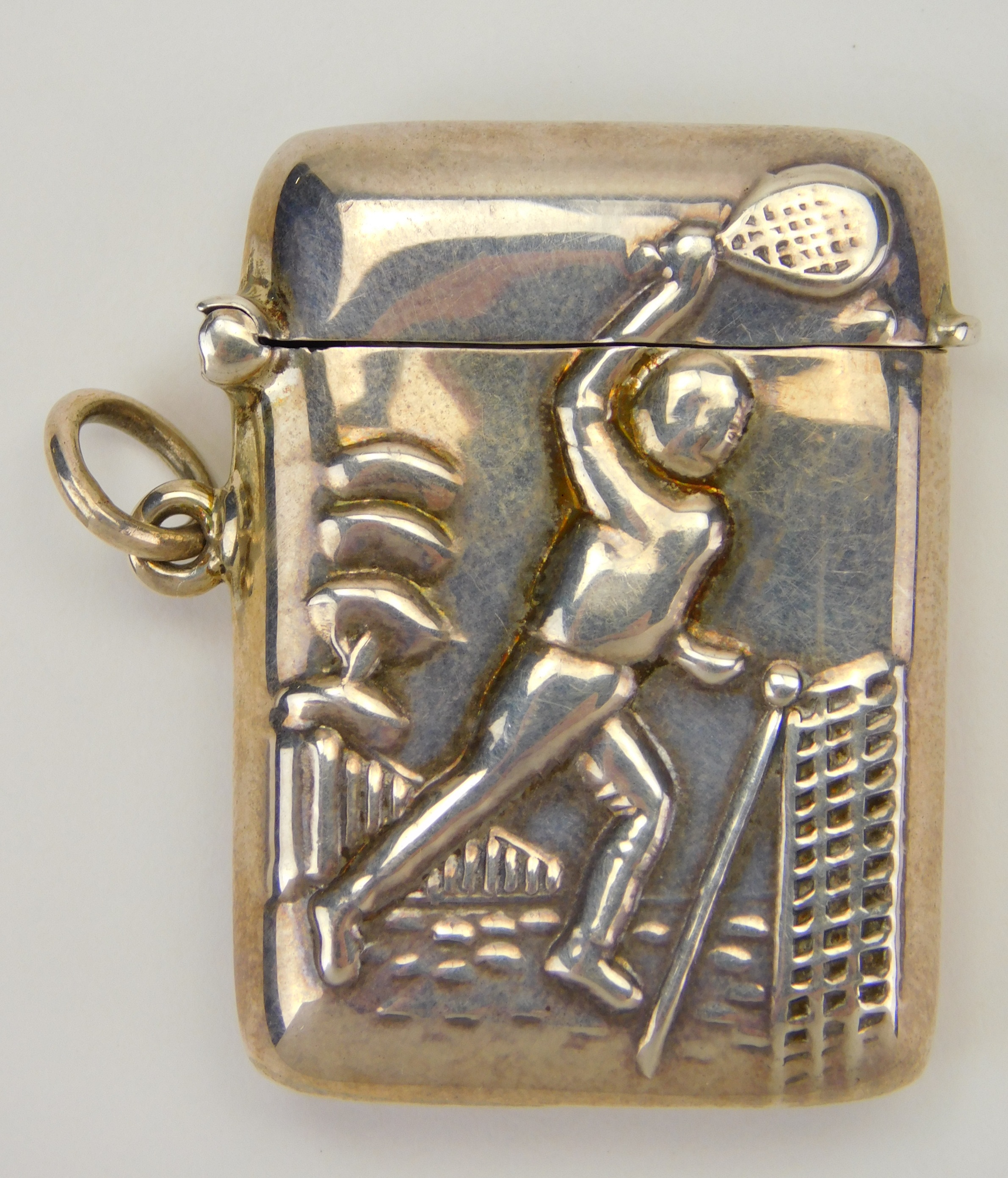 Appraisal: Sterling silver match safe with embossed figure of a tennis