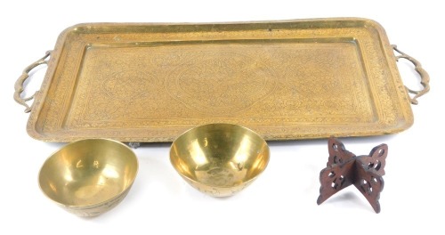 Appraisal: An early thC Indian brass twin handled tray engraved with