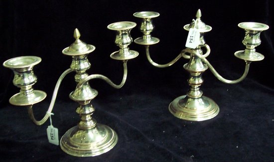 Appraisal: A pair of candelabra each of two branches with three