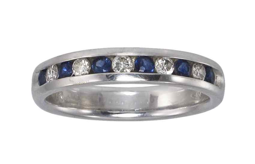 Appraisal: KT SAPPHIRE AND DIAMOND WEDDING BAND K white gold ring