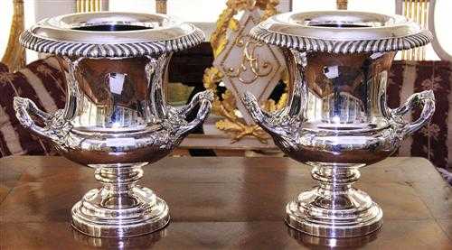 Appraisal: PAIR OF CHAMPAGNE COOLERS Silver-gilt Urn-shaped over a retracted profiled