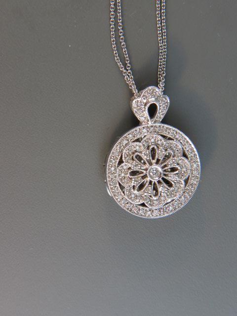 Appraisal: Diamond Locket round diamonds totaling carat in fancy k white