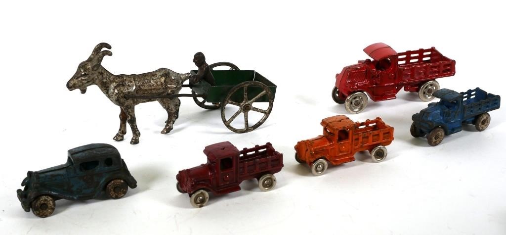 Appraisal: ANTIQUE CAST IRON TOYSSix piece cast iron toy lot including