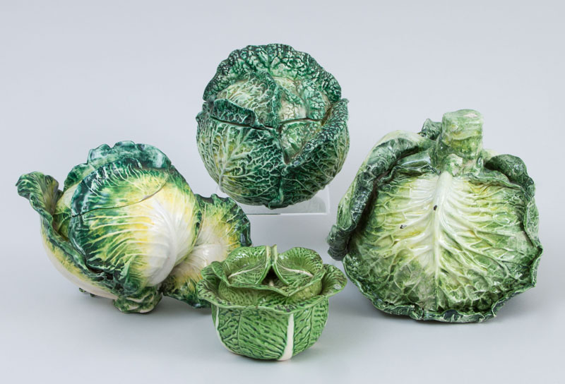 Appraisal: FOUR MAJOLICA CABBAGE-FORM TABLE ARTICLES Comprising a sauce tureen and