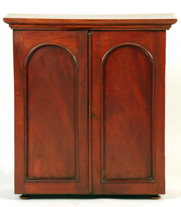 Appraisal: A low mahogany late th century table or hanging cupboard