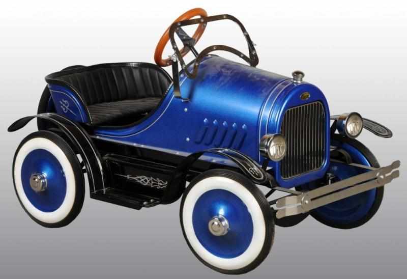 Appraisal: Pressed Steel s Style Pedal Car Description Reproduction of an