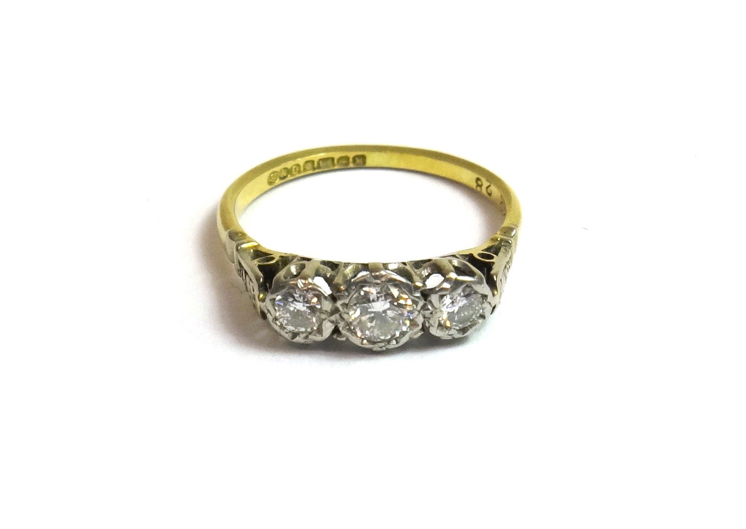 Appraisal: An ct gold and diamond set three stone ring mounted