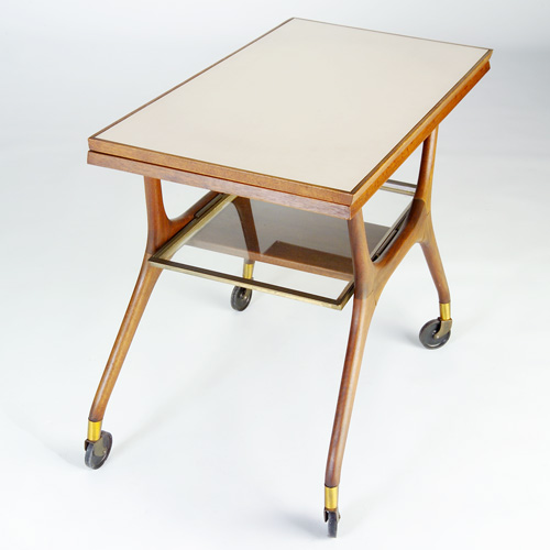 Appraisal: VLADIMIR KAGAN Serving cart its hinged top inset with tan