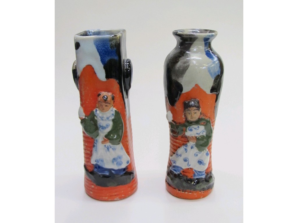 Appraisal: Two Sumida Gawa pottery vases each with a relief figure