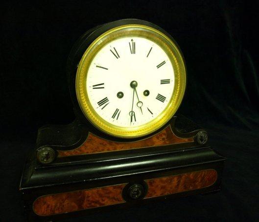 Appraisal: A late th Century mantel clock in an ebonised and