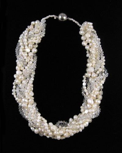 Appraisal: TWISTED MULTI-STRAND PEARL NECKLACE measuring - inches in length and