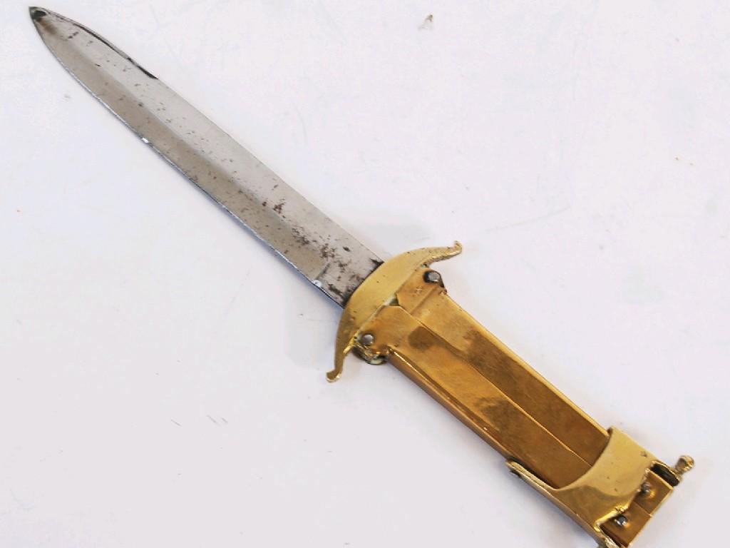 Appraisal: FRENCH ART BRASS FOLDING DAGGER with steel blade blade long