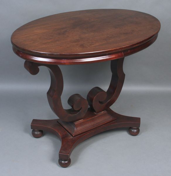 Appraisal: th Century Classical mahogany lyre-based hall table with oval top