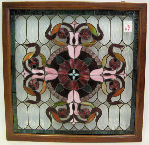 Appraisal: A STAINED AND LEADED GLASS WINDOW PANEL in the manner